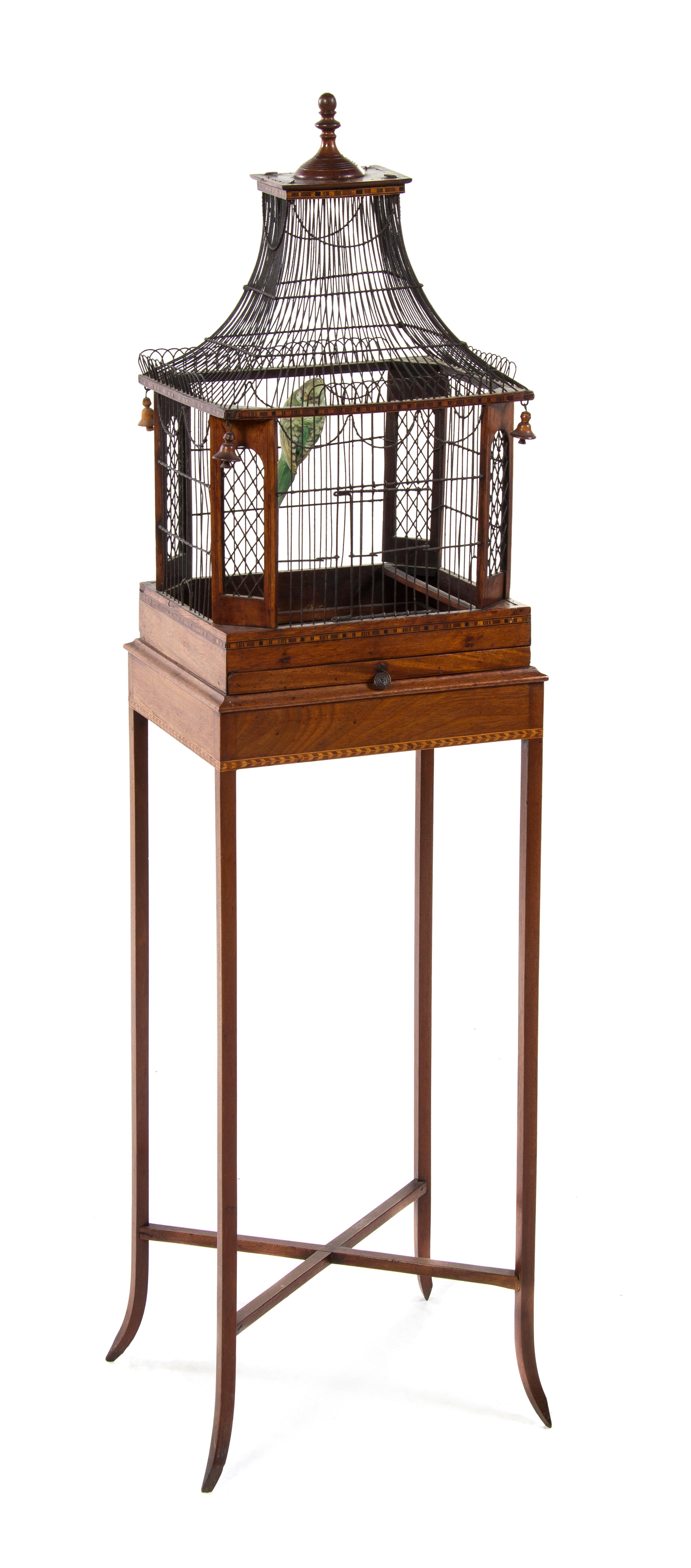 A Victorian Mahogany and Wirework Birdcage, Height overall 51 inches.