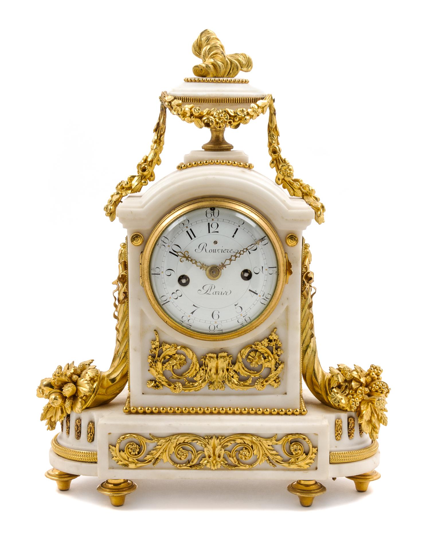 A Louis XVI Style Gilt Bronze and Marble Mantel Clock Height 15 1/2 inches. — 19TH CENTURY