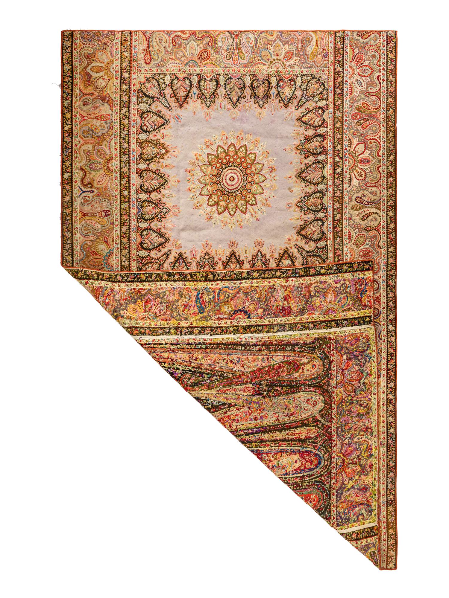 A Persian Paisley Needlework Rug