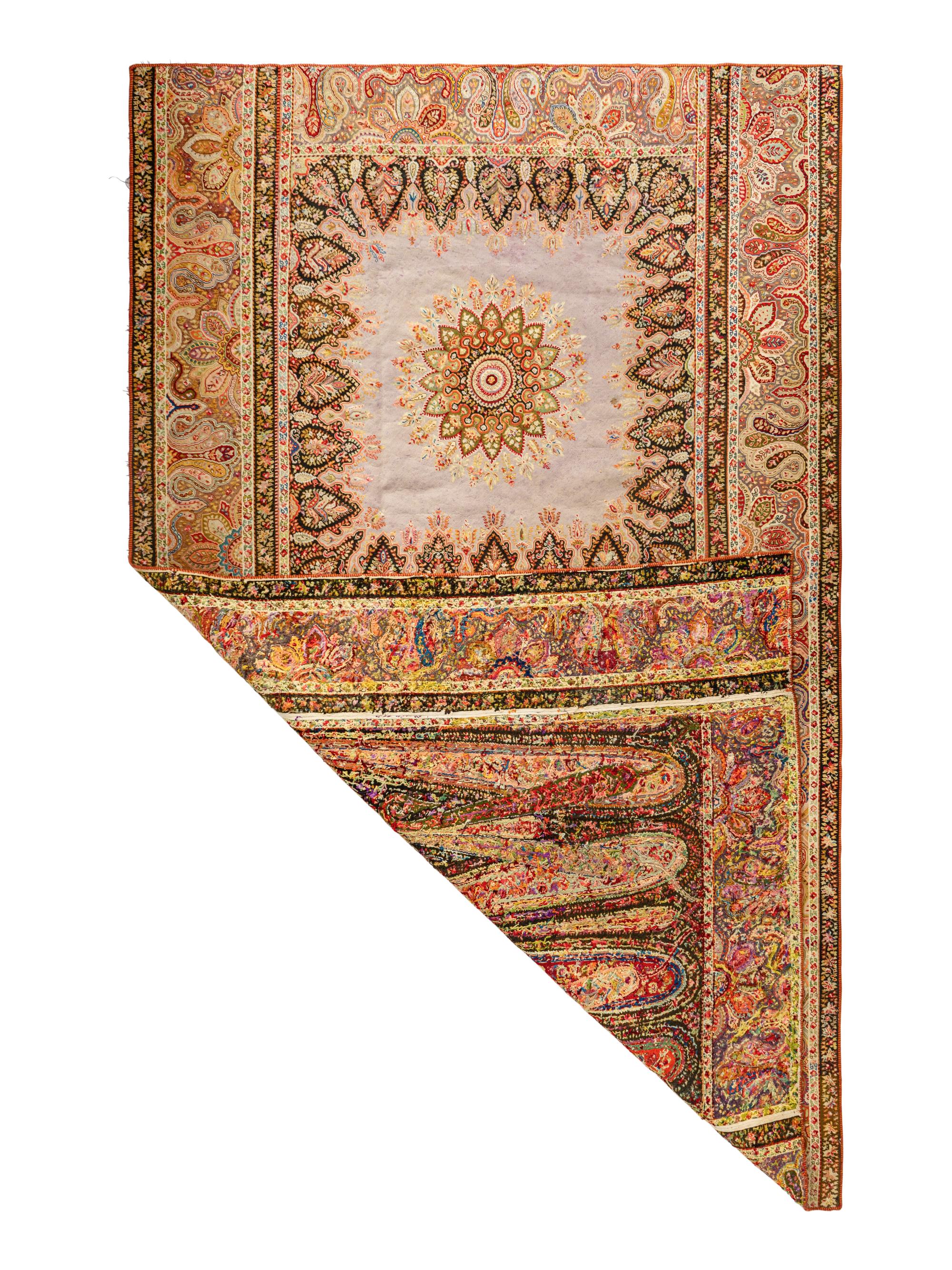 A Persian Paisley Needlework Rug
