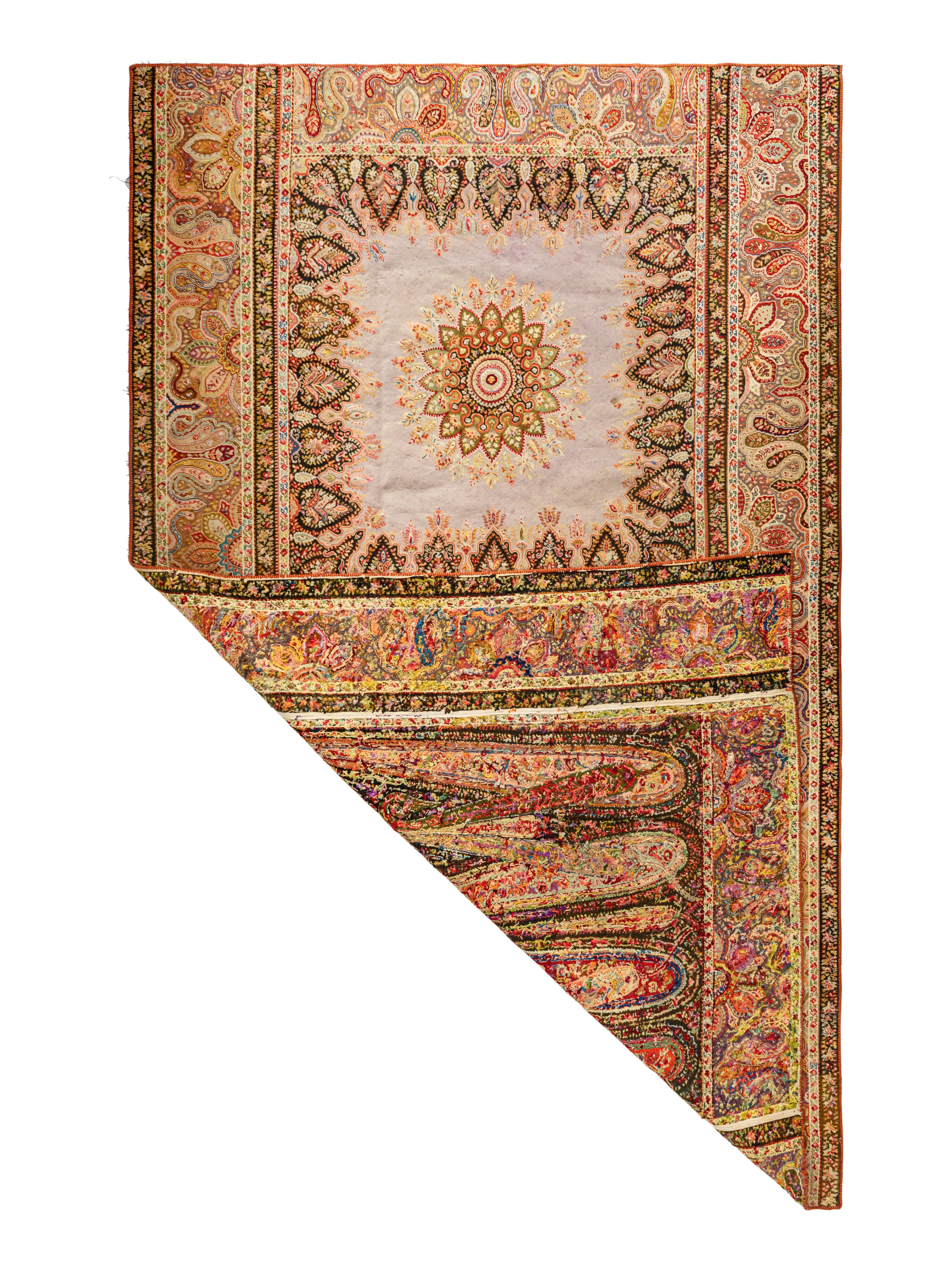 A Persian Paisley Needlework Rug