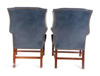 A Pair of George II Style Leather Upholstered Wingback Chairs — 19TH CENTURY