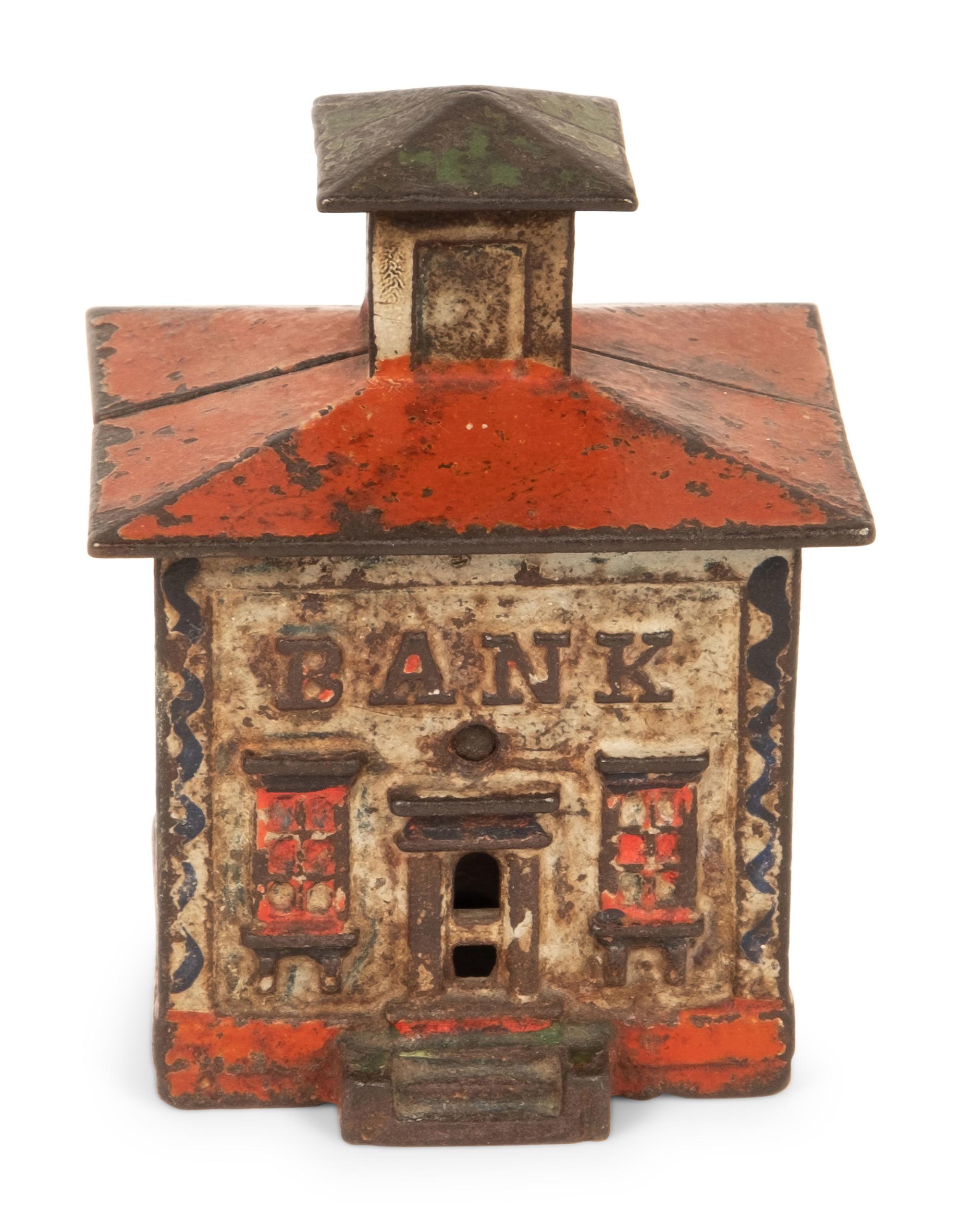 An Old Honesty Cast Iron Indian Cigar Bank, PLUS