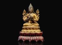 A Tibeto-Chinese gilt bronze seated figure of Tsong Khapa, 18th century 藏傳佛教宗喀巴銅鎏金像 十八世紀