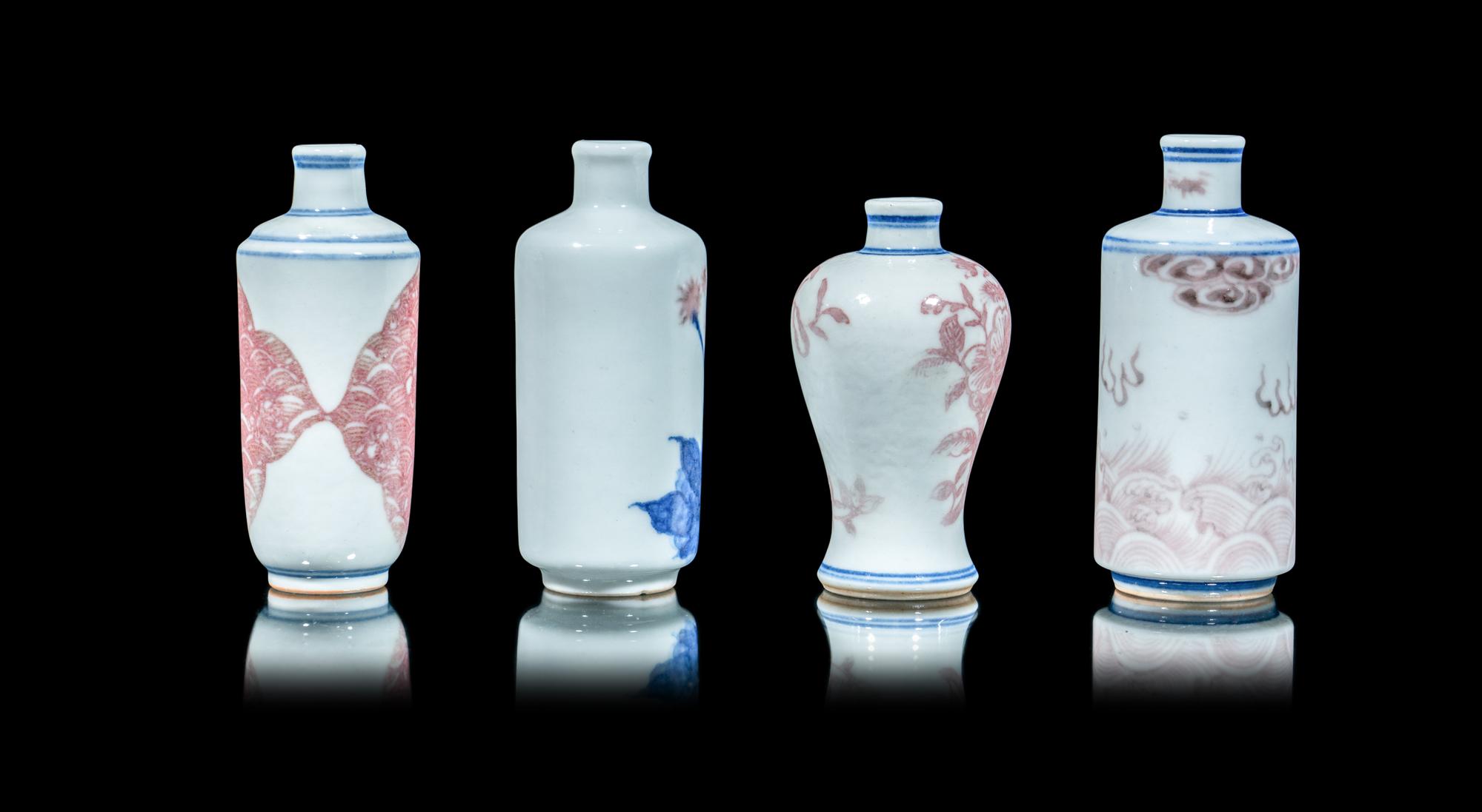 Four Chinese Copper Red Decorated Blue and White Snuff Bottles