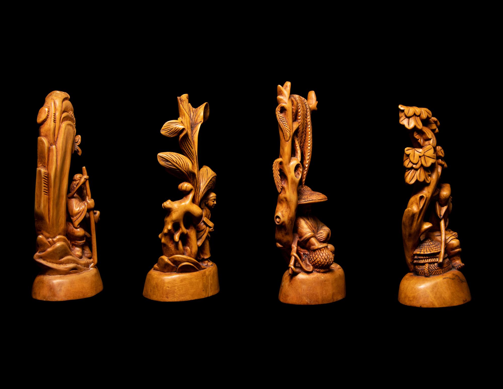 Seven Chinese Carved Hardwood Figures