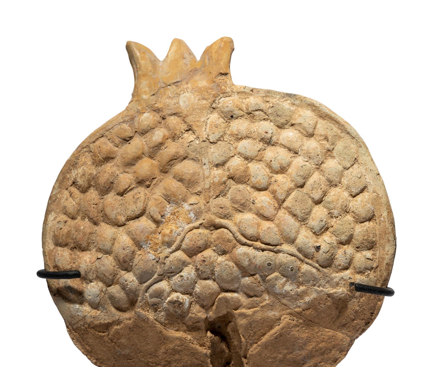 A Western Greek Terracotta Pomegranate