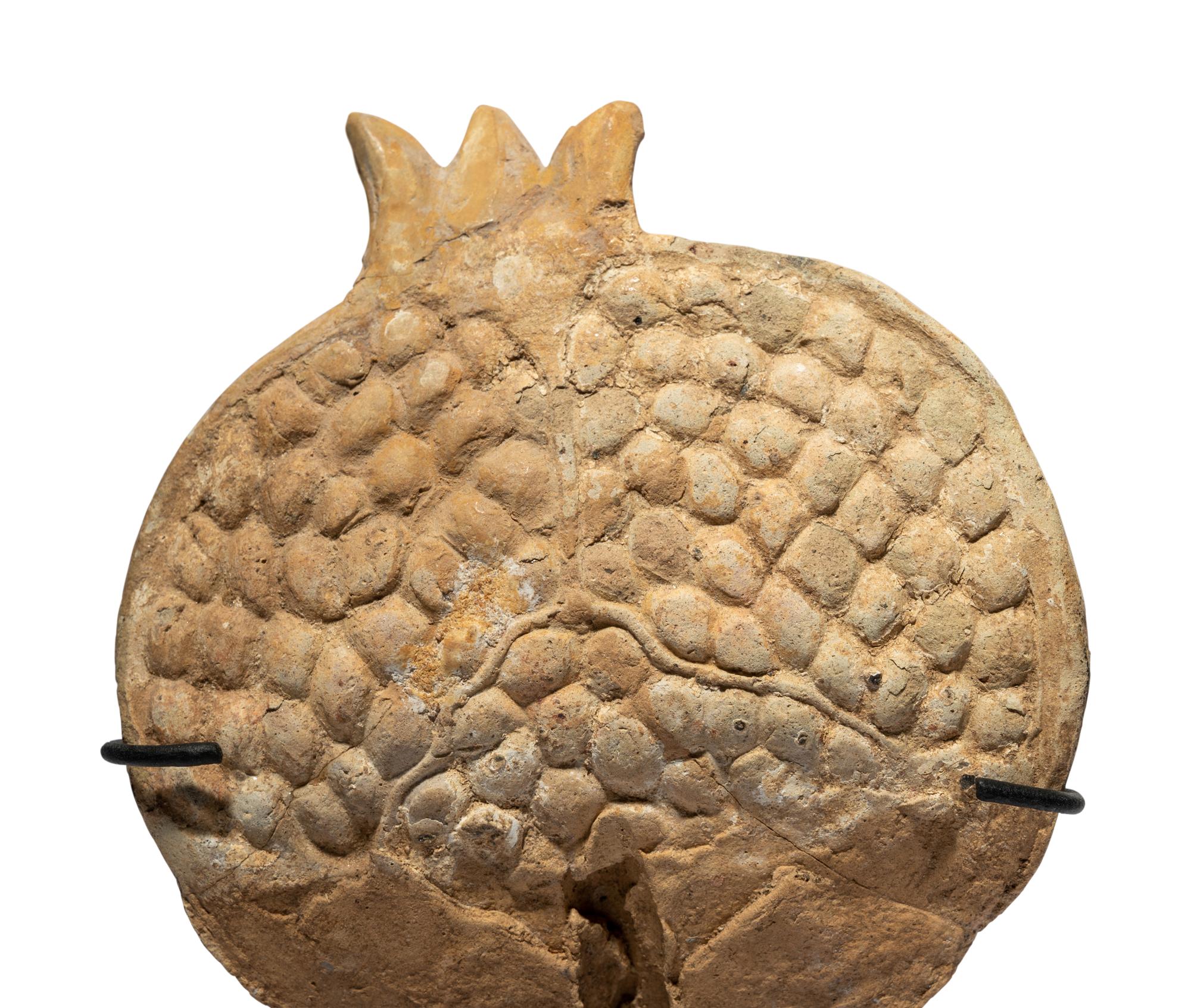 A Western Greek Terracotta Pomegranate