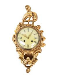 A Rococo Style Giltwood Cartel Clock