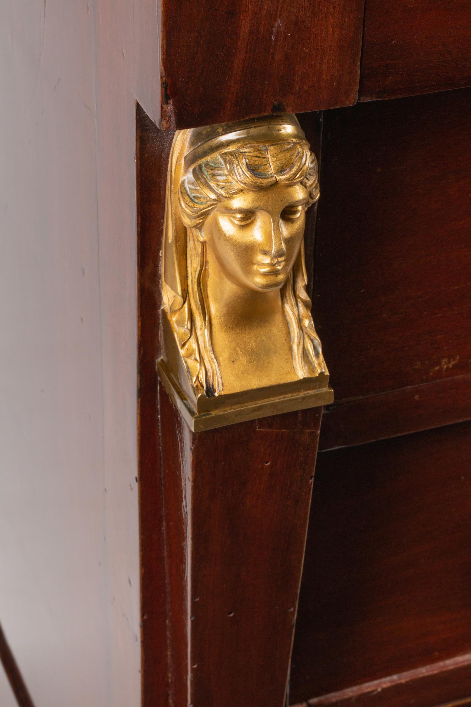 An Empire Style Gilt Bronze Mounted Mahogany Marble-Top Commode