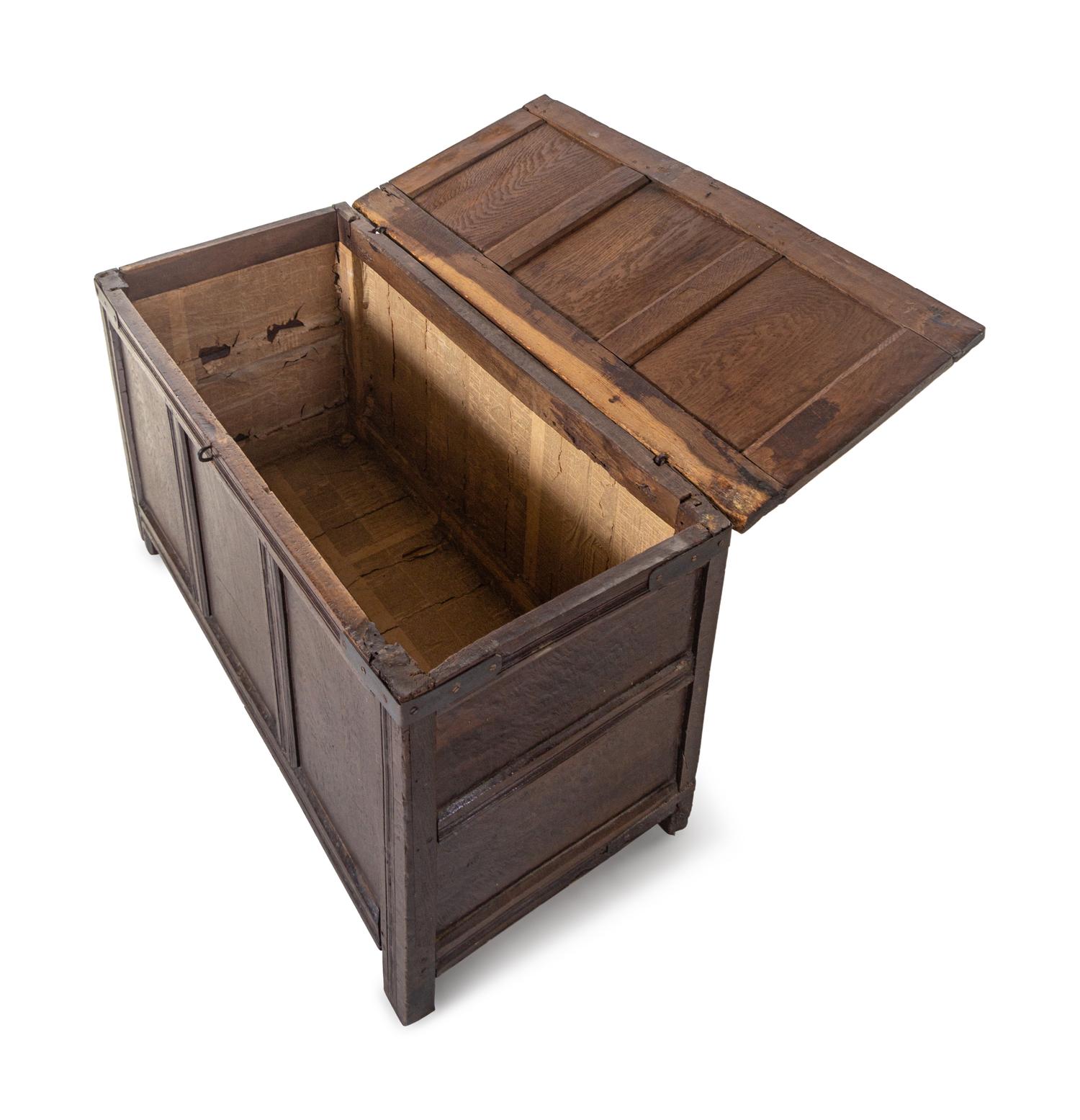 A Jacobean Iron Mounted Molded and Paneled Oak Storage Chest