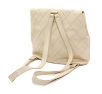 A Chanel Cream Caviar Leather Quilted Backpack, 12"x 10" x 3".