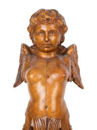 A Pair of Italian Carved Walnut Putti on Fluted Bases — 18TH/19TH CENTURY