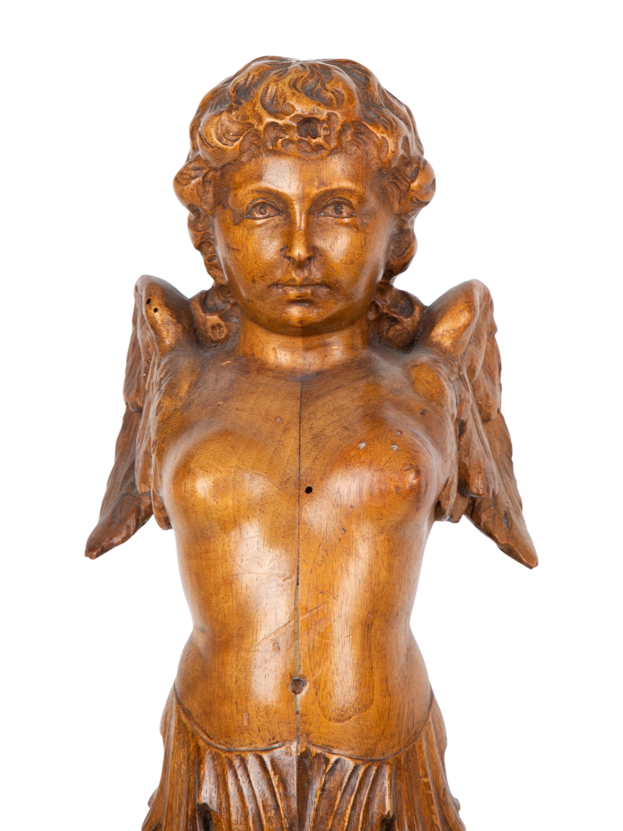 A Pair of Italian Carved Walnut Putti on Fluted Bases — 18TH/19TH CENTURY