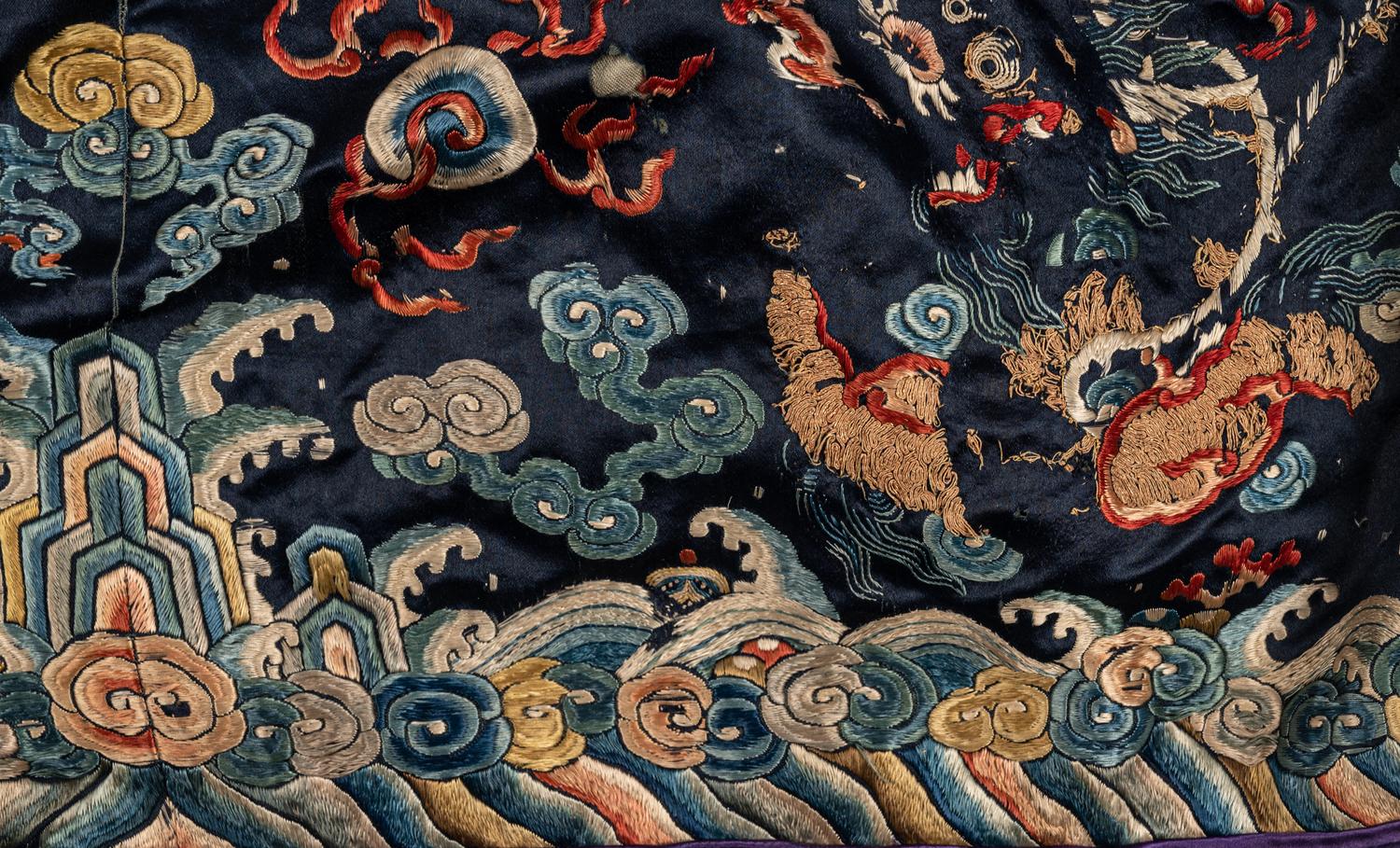 A Chinese Navy Blue Ground Embroidered Silk Court Robe, Chaofu