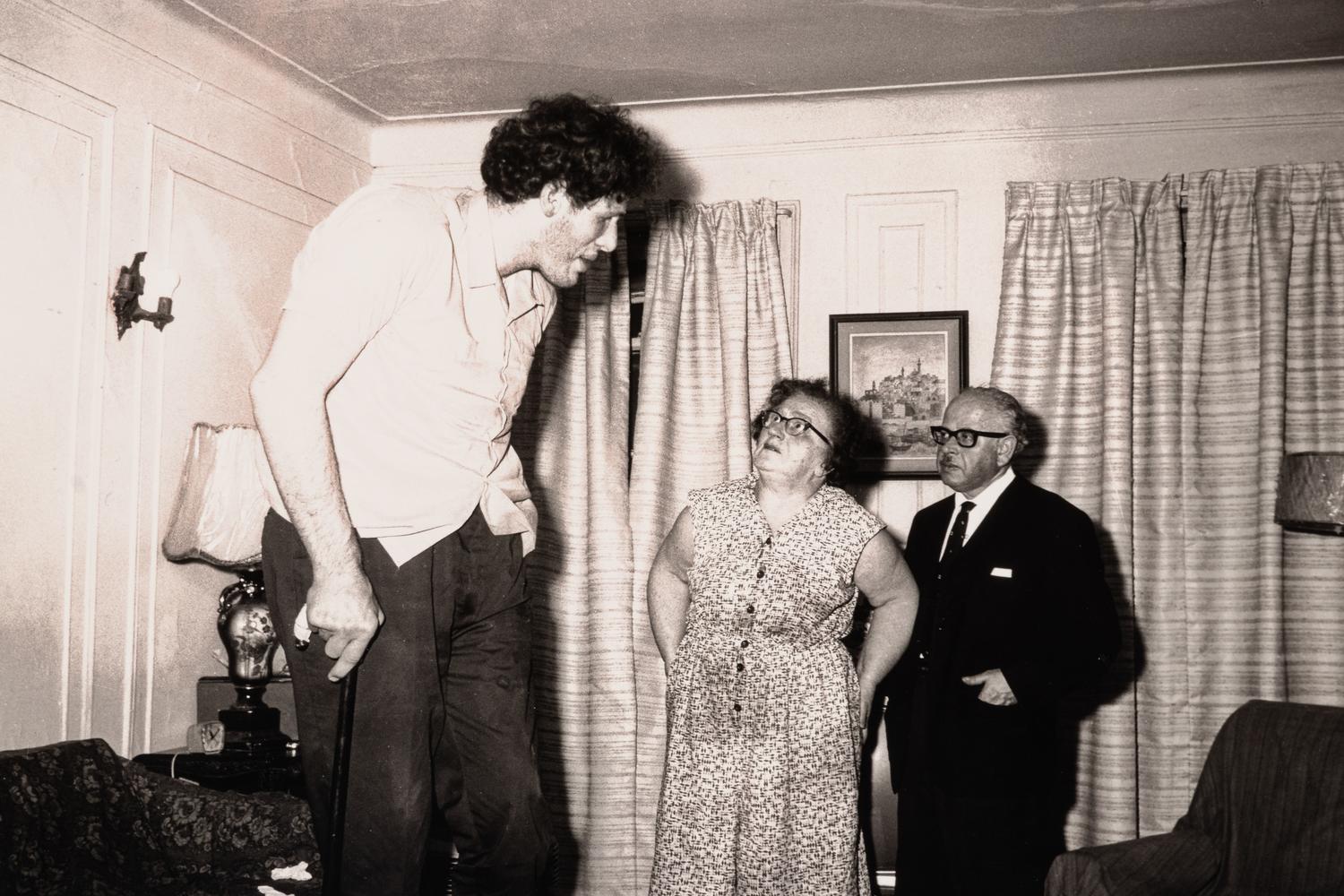 Diane Arbus (1923-1971) A Jewish giant at home with his parents in the Bronx, N.Y., 1970, from "A box of ten photographs," 1969-1973