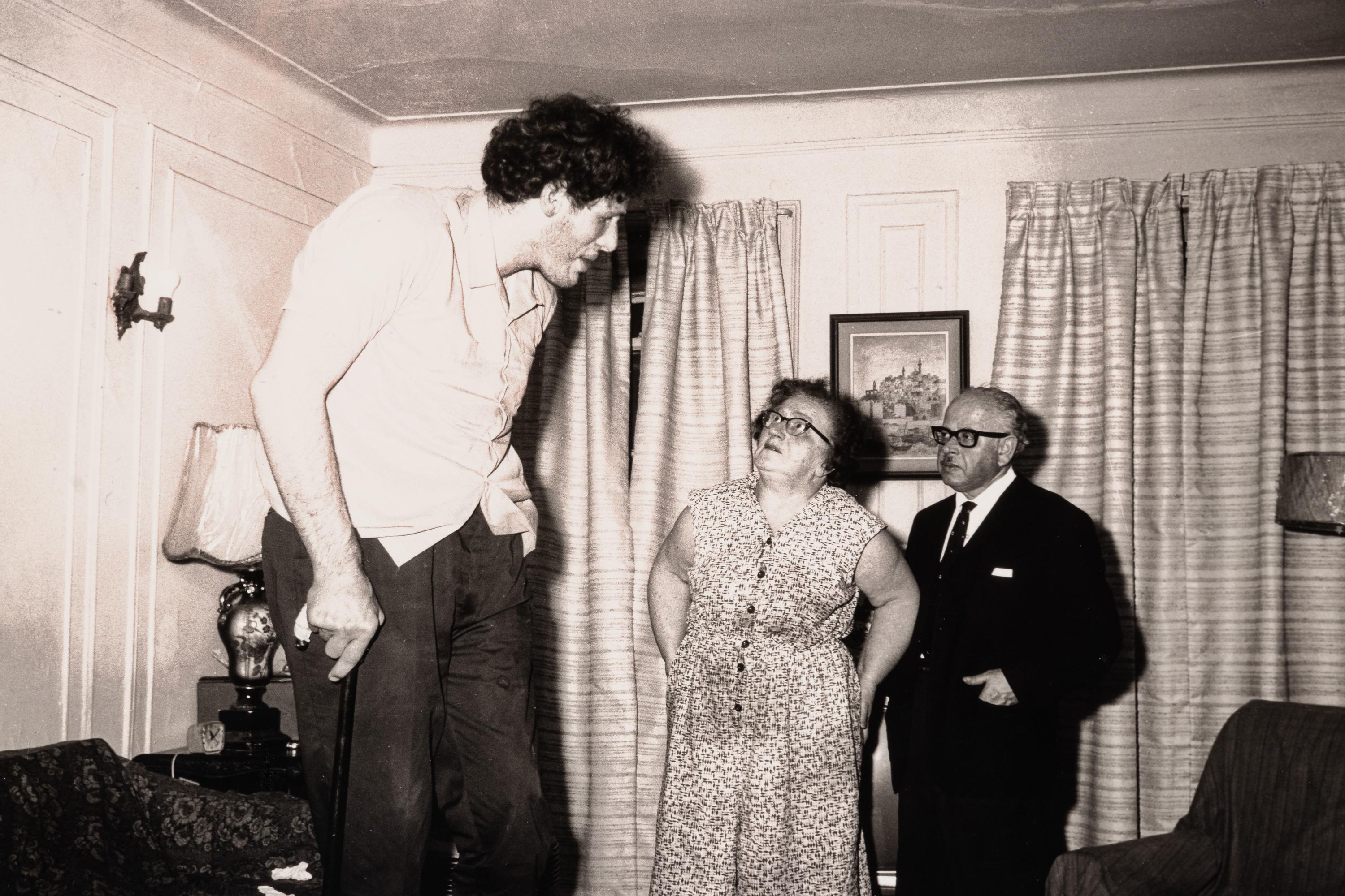 Diane Arbus (1923-1971) A Jewish giant at home with his parents in the Bronx, N.Y., 1970, from "A box of ten photographs," 1969-1973