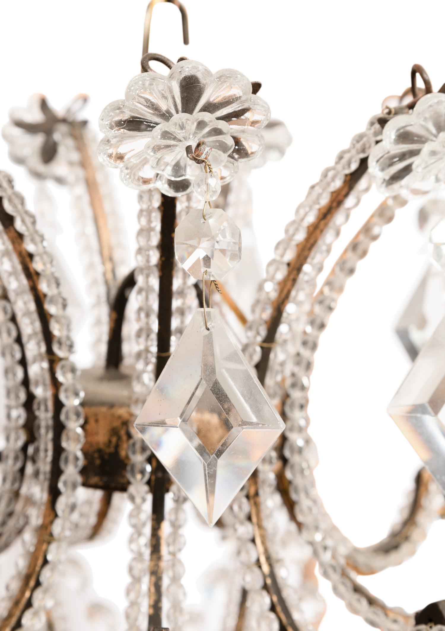 A Gilt Bronze and Cut Glass Eighteen-Light Chandelier