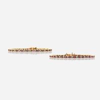 A pair of ruby, diamond, and gold bracelets