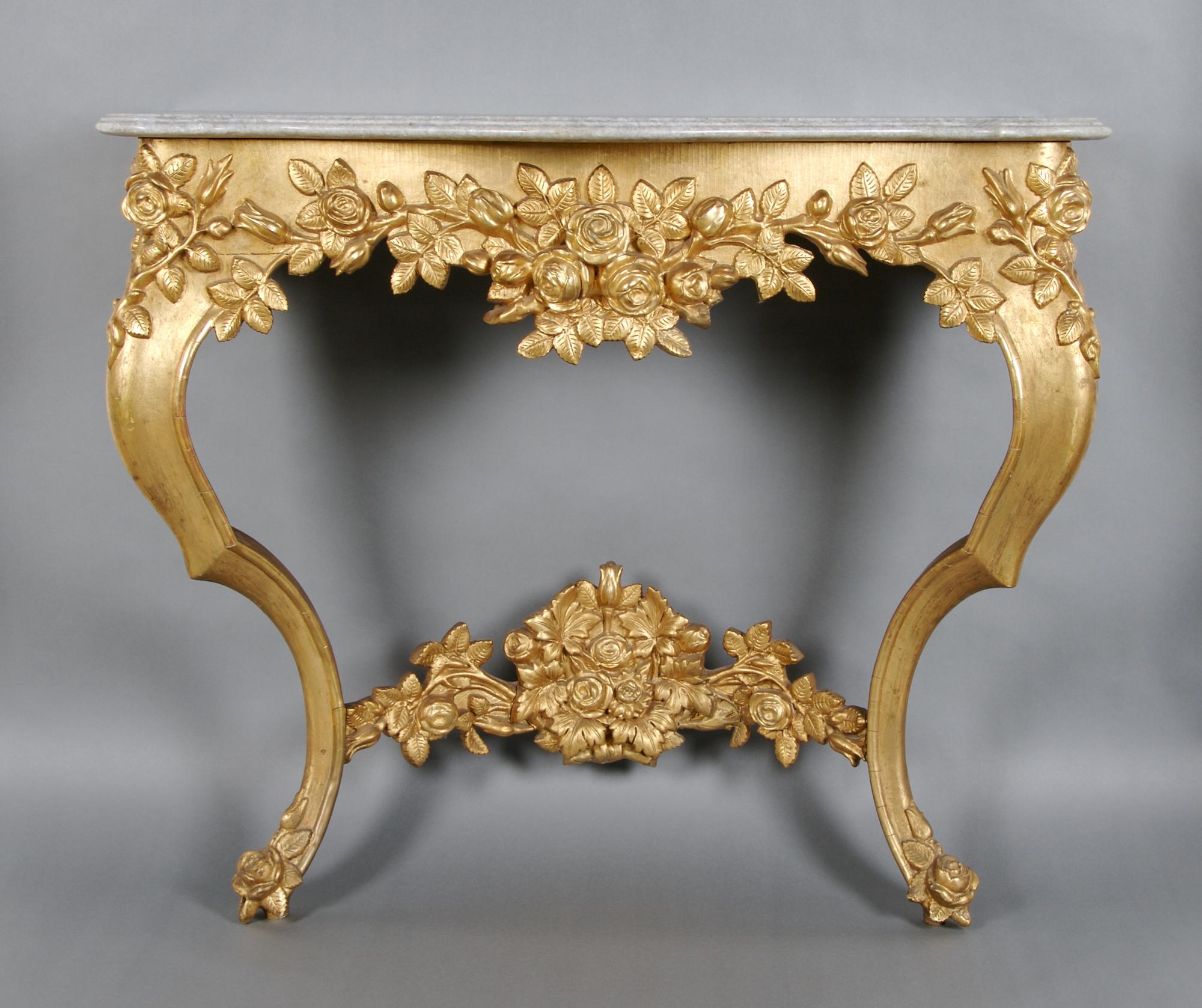 A Victorian Giltwood Console Table, Height 32 x width 37 x depth 17 inches.