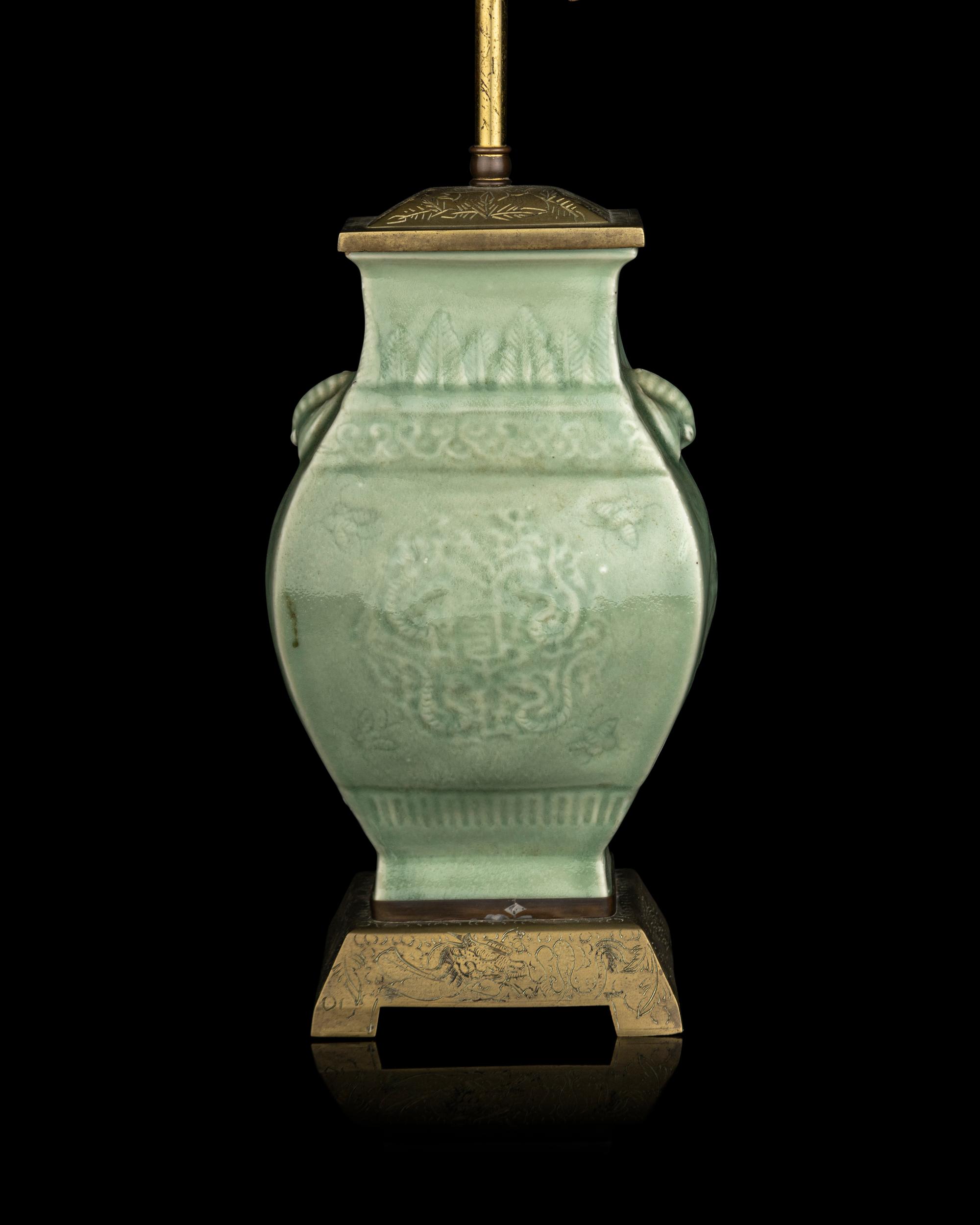 A Chinese Carved Celadon Glazed Porcelain Hu Vase