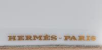 A Set of Four Hermès Porcelain Ashtrays
