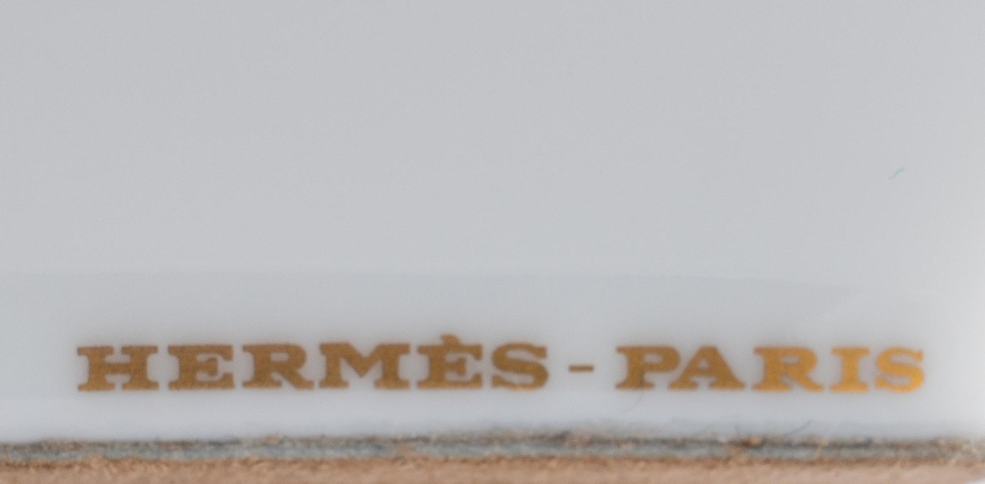 A Set of Four Hermès Porcelain Ashtrays
