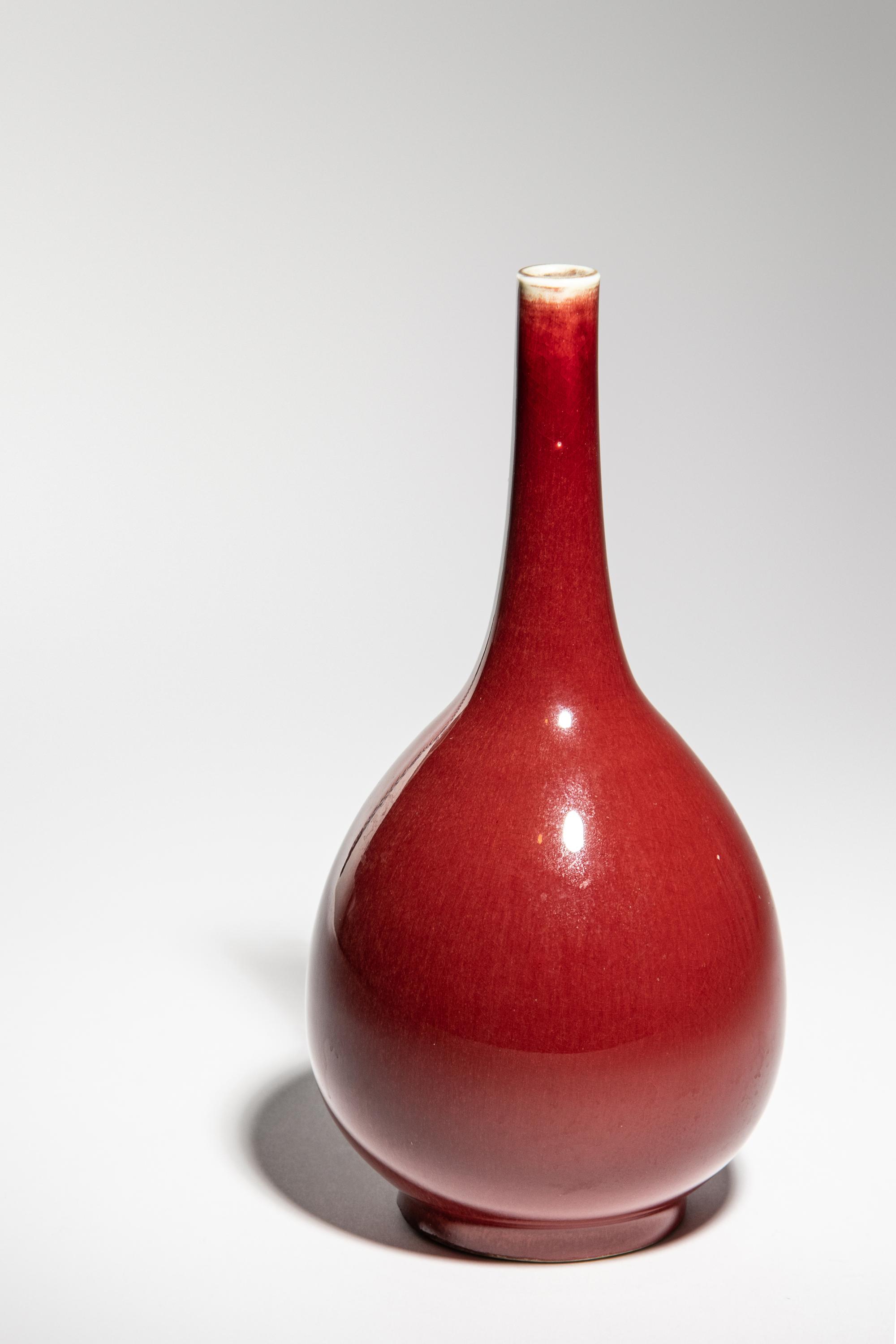 Two Sang-de-Boeuf Glazed Porcelain Bottle Vases