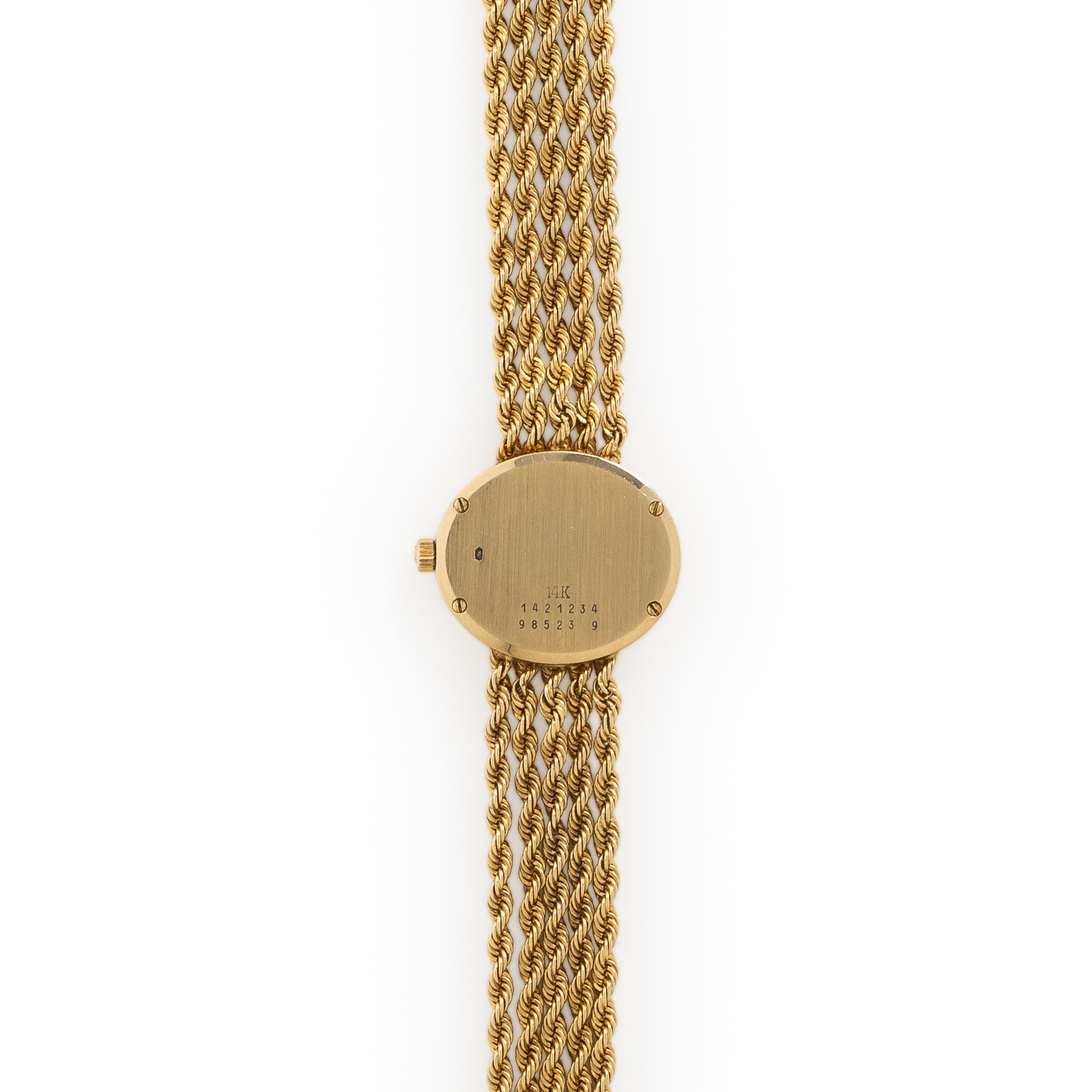 Baume & Mercier, Ref. 98523-9, 14K Yellow Gold Watch with Diamond Bezel