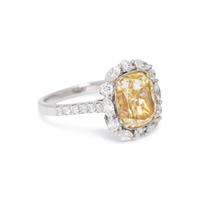 FANCY YELLOW DIAMOND AND DIAMOND RING
