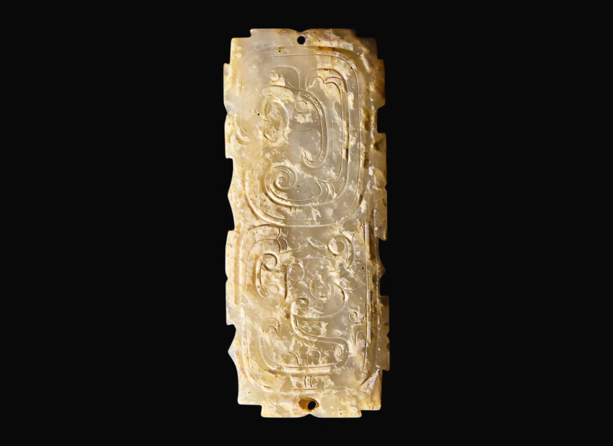 A Chinese "Dragon and Phoenix" calcified jade fitting, probably Western Zhou 龍鳳紋玉牌飾 或西周