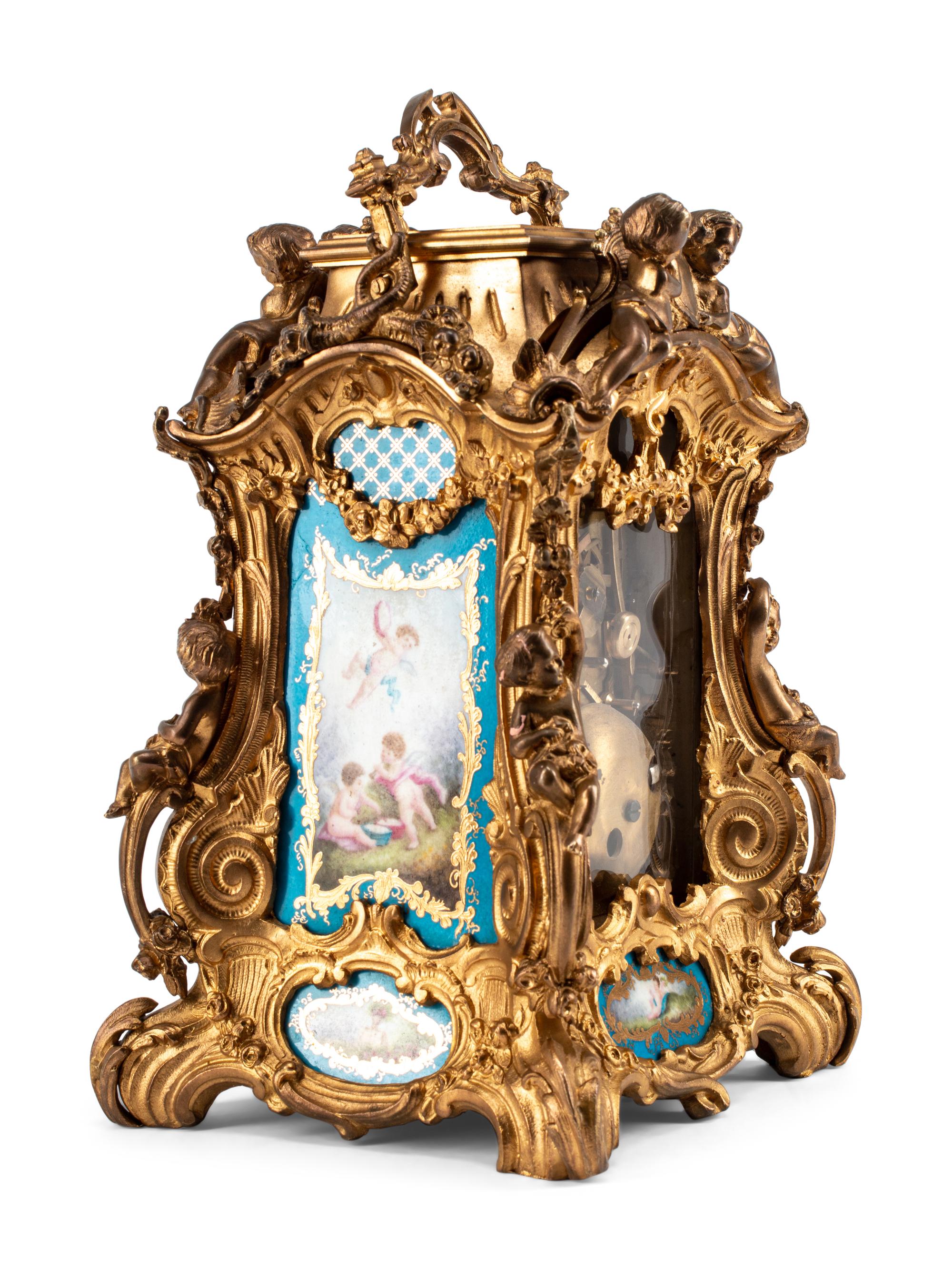 A Gilt Bronze and Sèvres Style Porcelain Carriage Clock