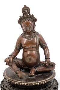 A Nepalese Bronze and Silver Figure of Seated Kubera