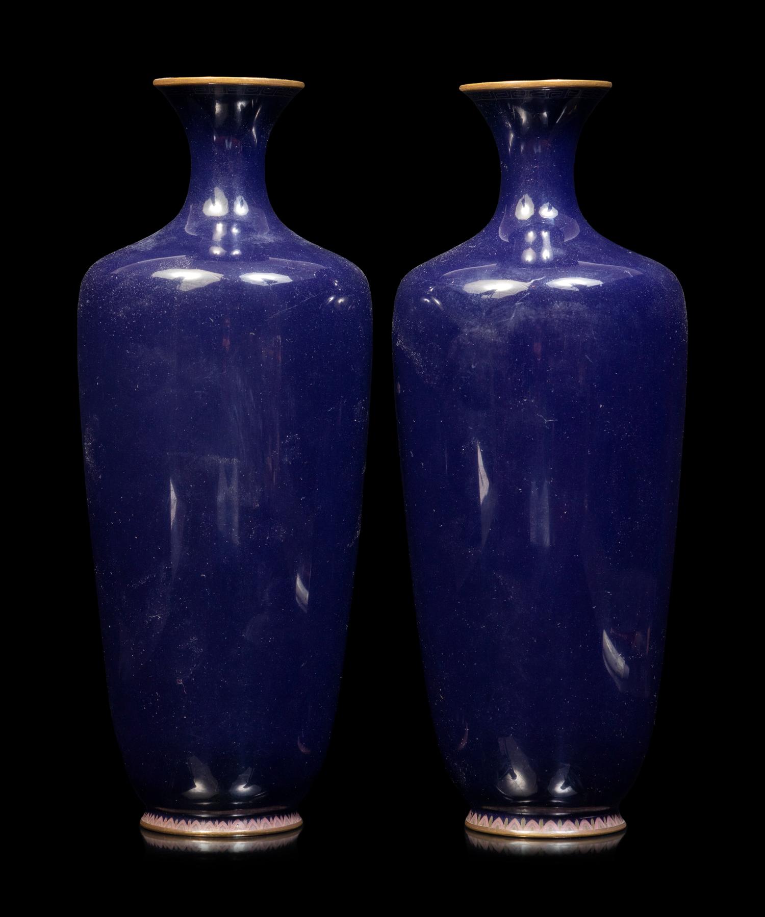 A Pair of Black Ground Cloisonné Vases and A Black Ground Polychrome Enameled Porcelain Charger