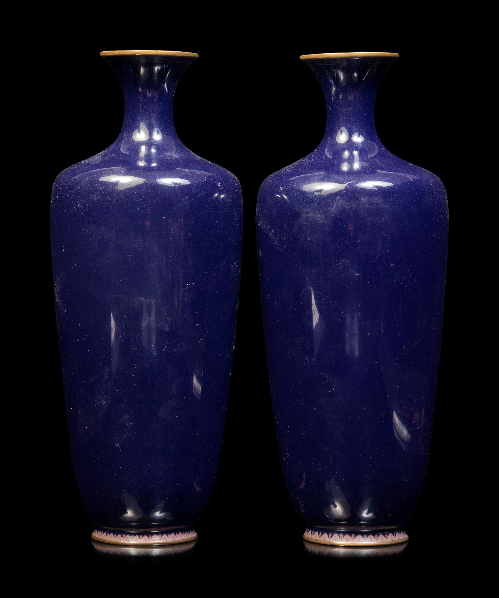 A Pair of Black Ground Cloisonné Vases and A Black Ground Polychrome Enameled Porcelain Charger