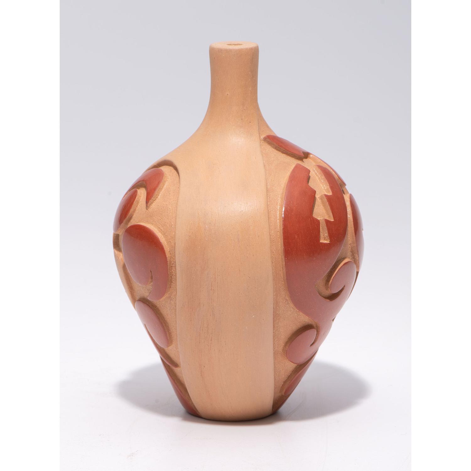 Carved Micaceous Redware Jar, with Avanyu and Raindrops