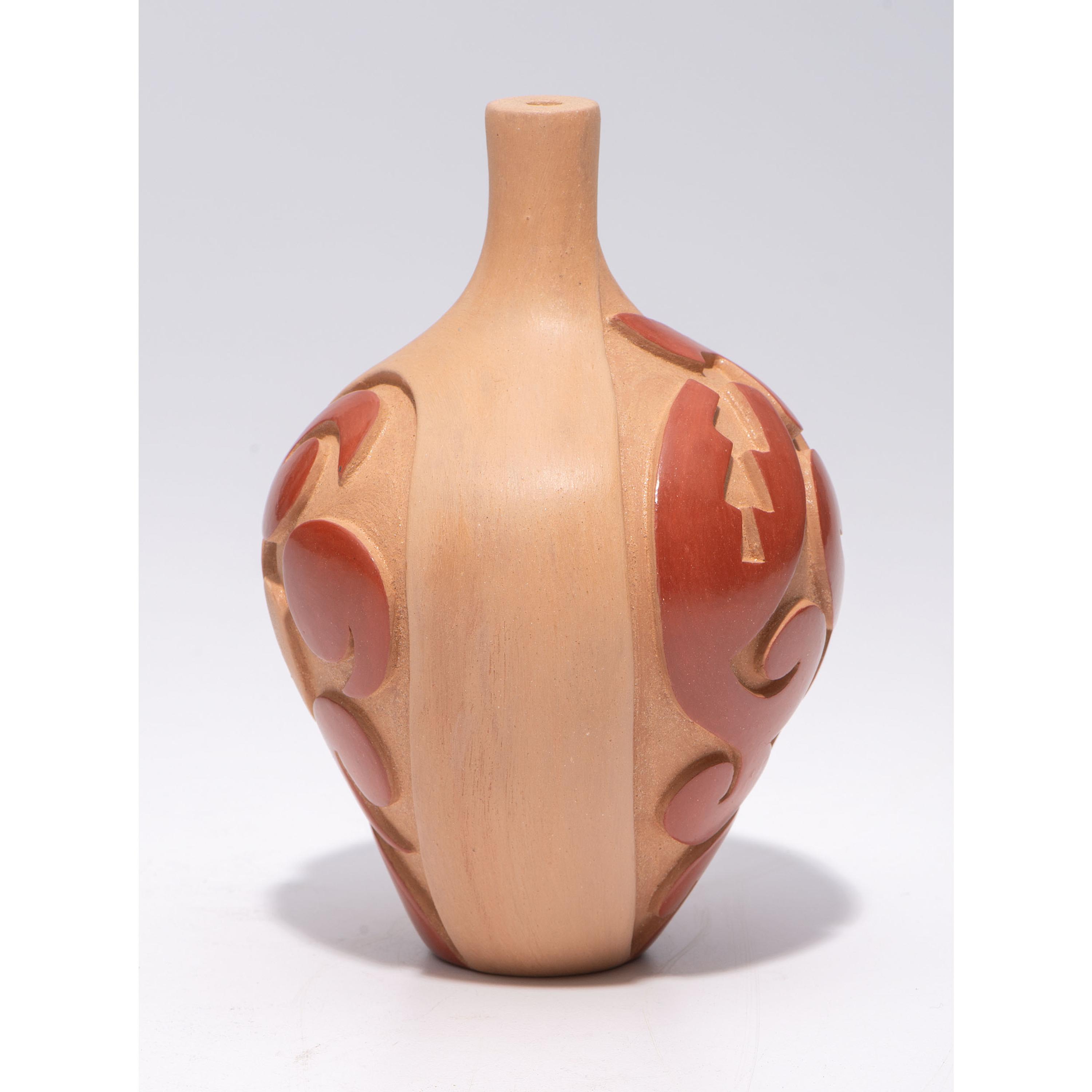 Carved Micaceous Redware Jar, with Avanyu and Raindrops