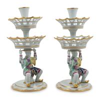 A Pair of Mottahedeh Parcel Gilt Tobacco Leaf Decorated Porcelain Figural Epergne