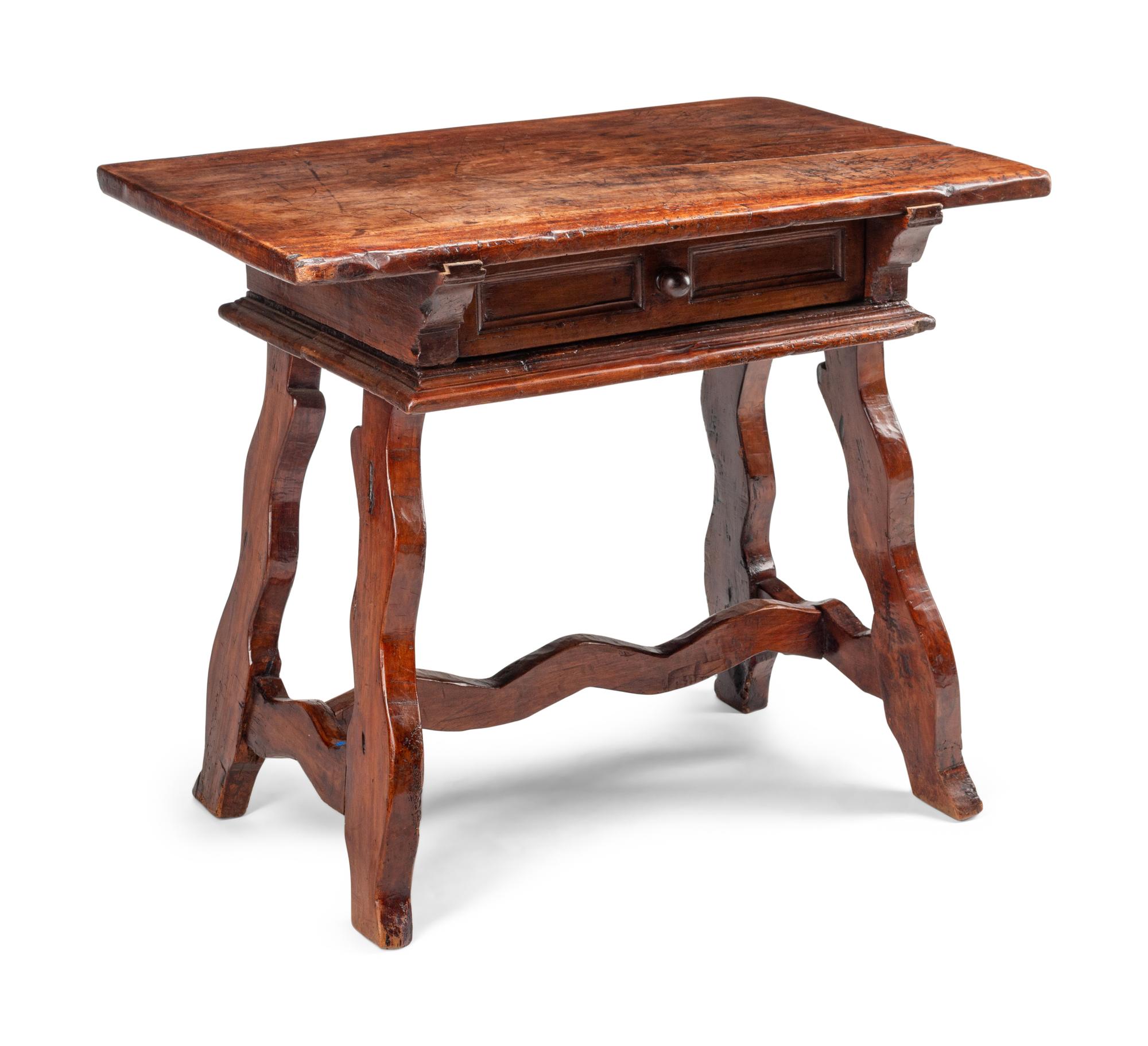 An Italian Baroque Walnut Trestle Table