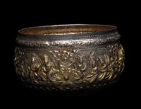 A Burmese Silver-Gilt Repoussé Bowl