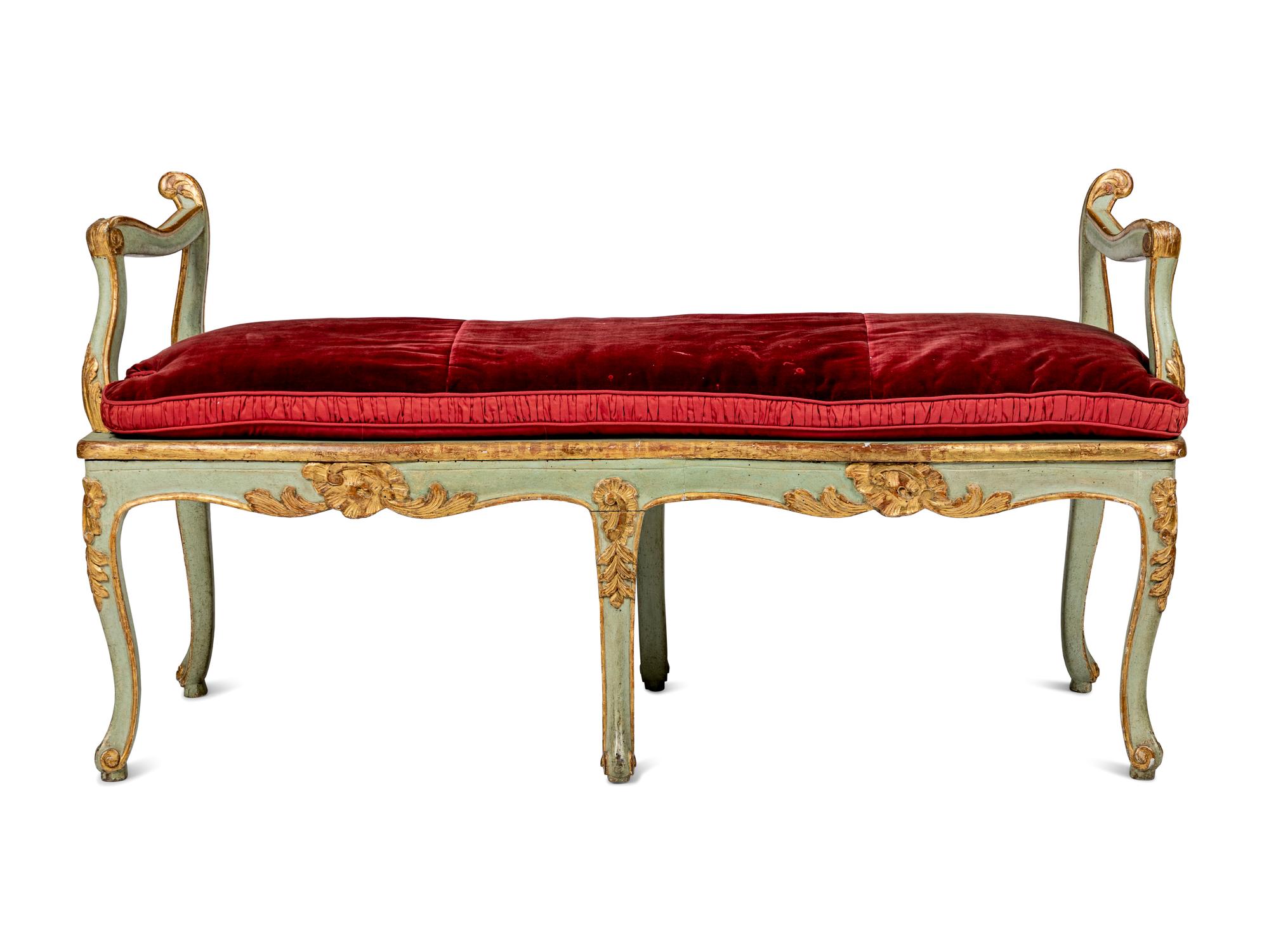 A Pair of Louis XV Green-Painted and Parcel-Gilt Cane Seat Window Benches