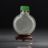 A Chinese Carved "Spanish Coin" Snuff Bottle, Qing Dynasty, Circa 1800-1850 — 1800-1850年 西班牙銀幣紋鼻煙壺