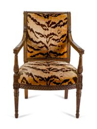 A French Empire Style Carved Mahogany Fauteuil — 20TH CENTURY