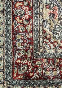 A Silk Tabriz Rug