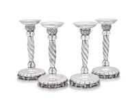 A Set of Four Georg Jensen Grapevine Silver Candlesticks