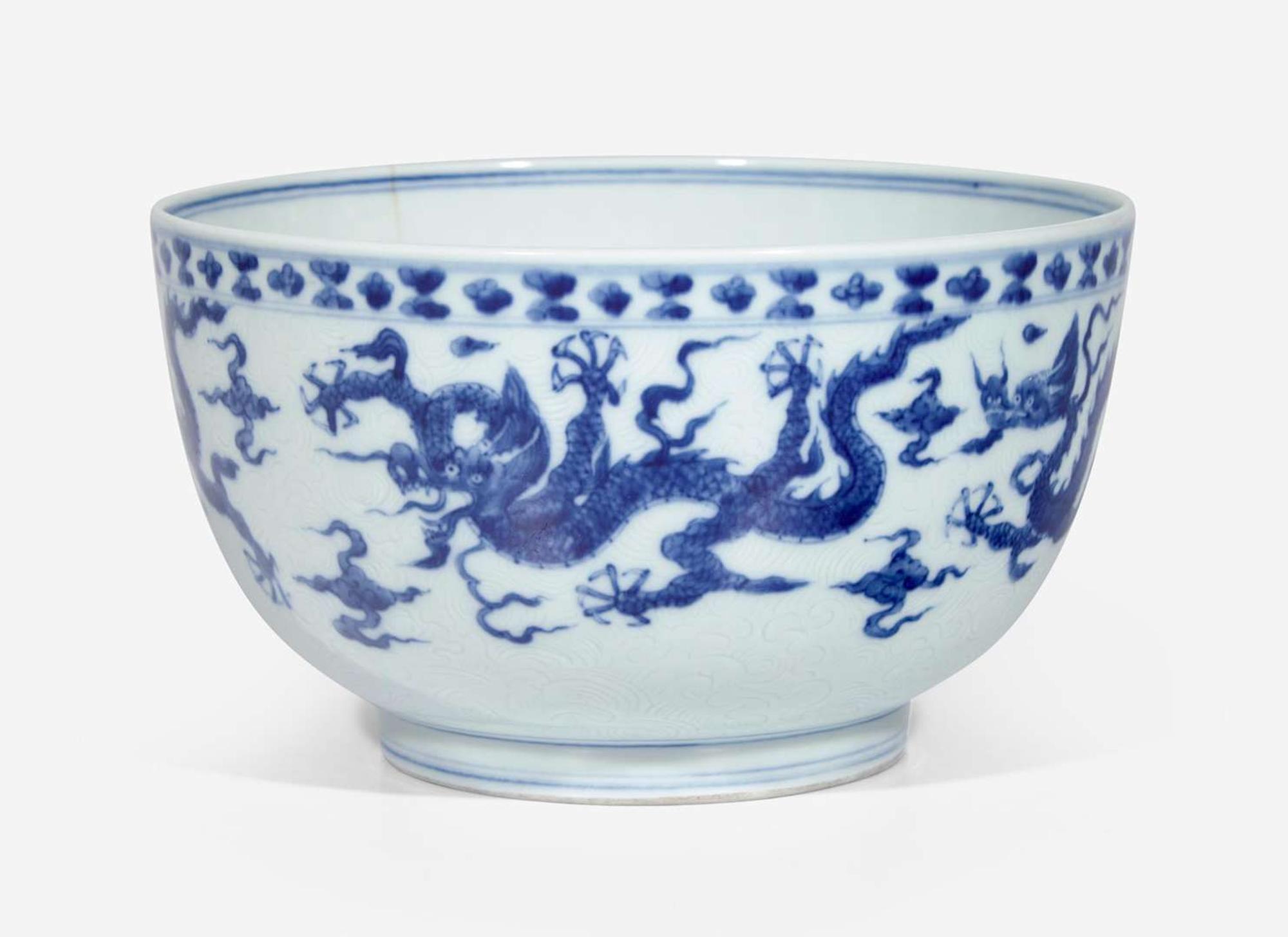 An unusual Chinese blue and white "Dragon" deep bowl, Zhengde mark, possibly 18th century 青花龍紋深腹盌 正德款 或十八世紀