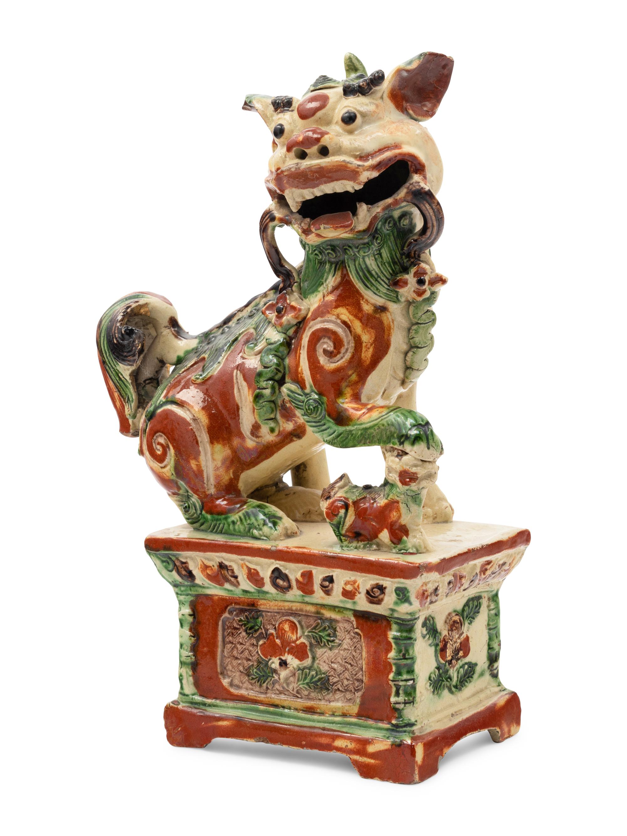 Nine Chinese Porcelain Figures of Fu Lions
