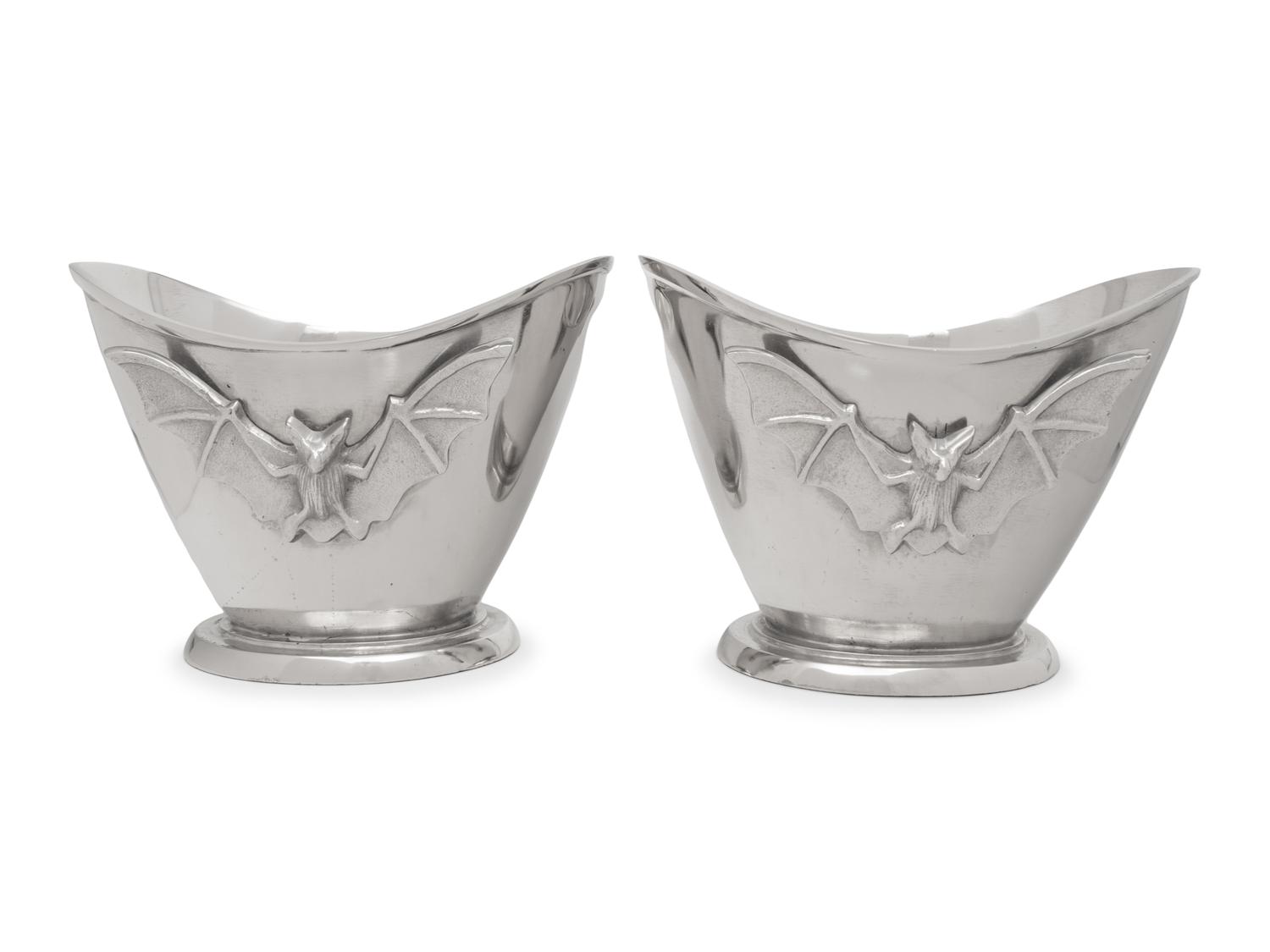 A Pair of Silvered Metal Wine Coolers with Bat Motif