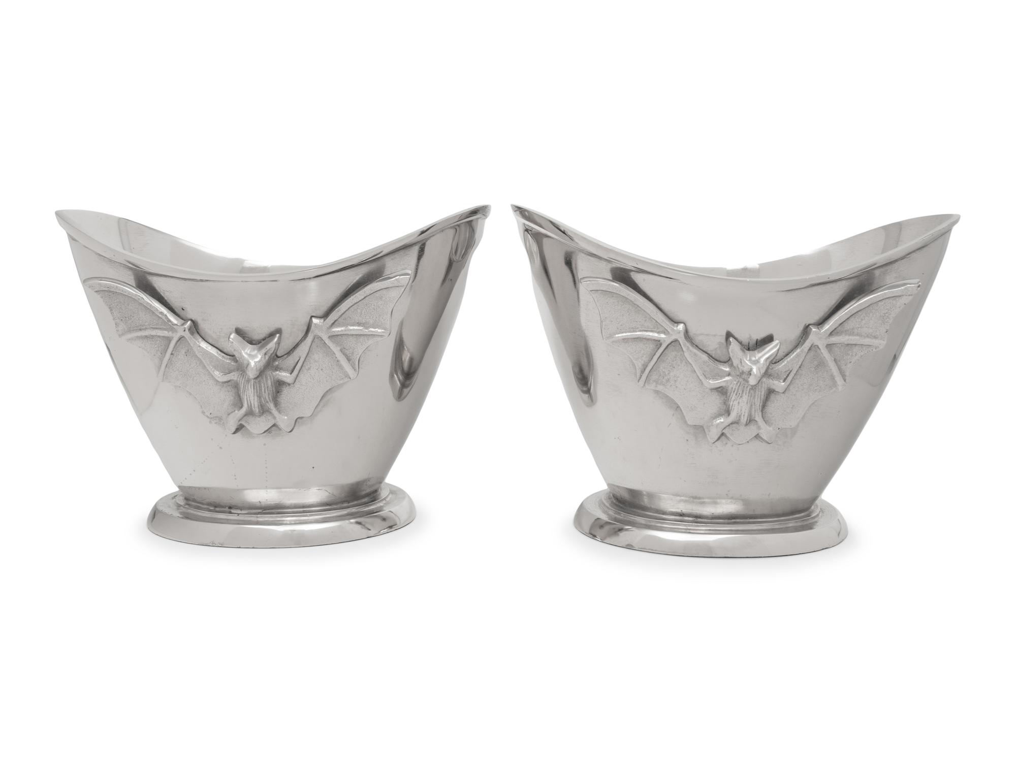 A Pair of Silvered Metal Wine Coolers with Bat Motif