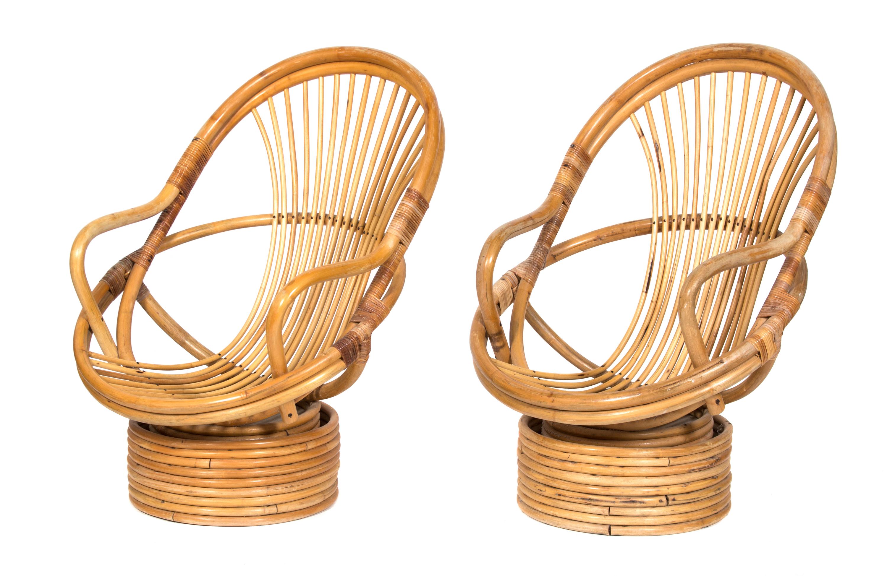 A Pair of Barrel-Back Rattan Armchairs on Swivel Bases Height 40 inches. — 20TH CENTURY